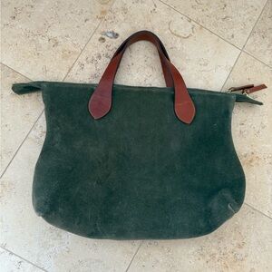 Green suede bag in style of Parker Thatch Charlie.